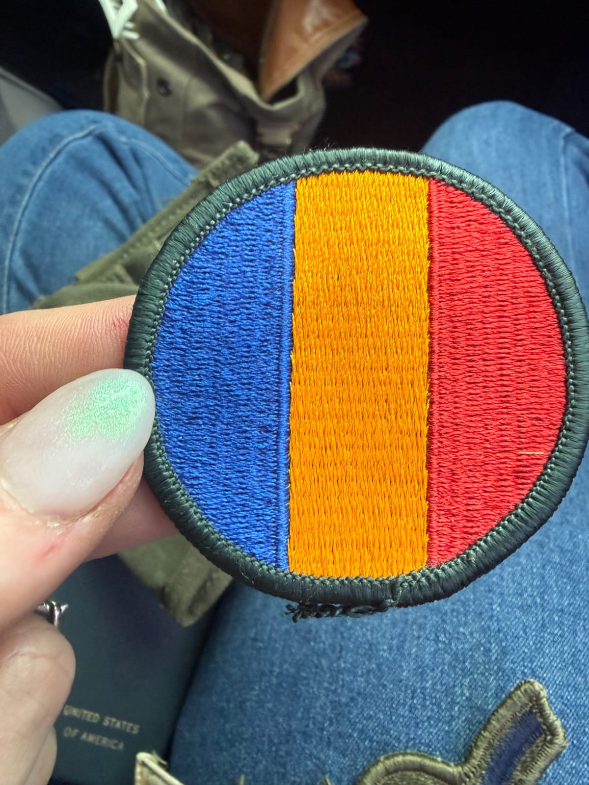 Embroidered military-style shoulder patch or insignia