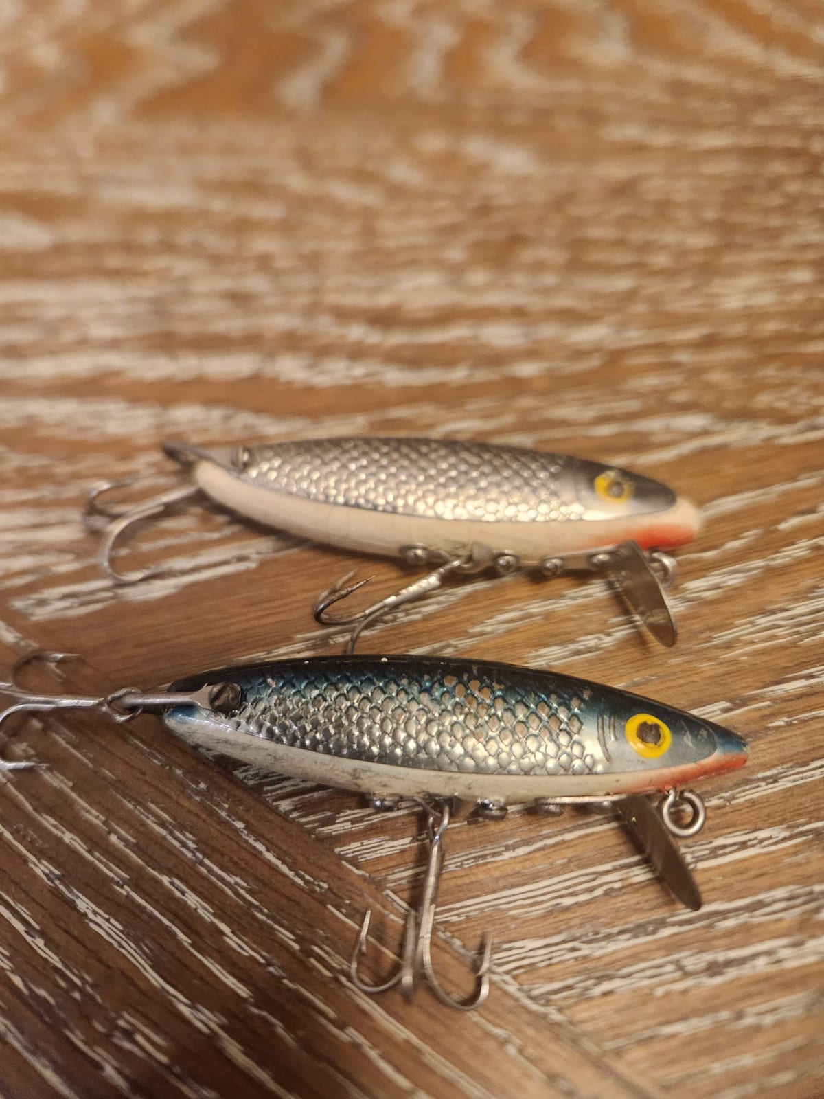 Vintage fishing lure, likely a wooden topwater plug or minnow bait