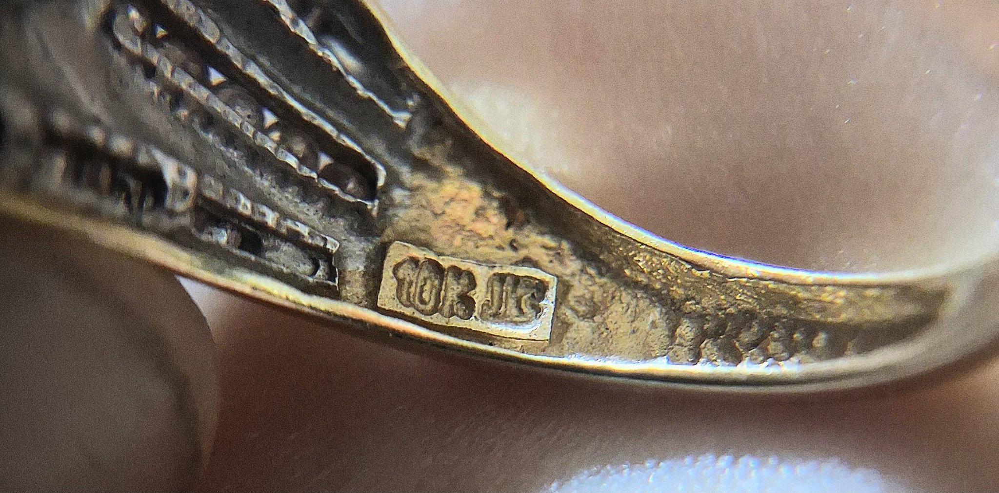 Gold ring with maker's mark "TORIG"