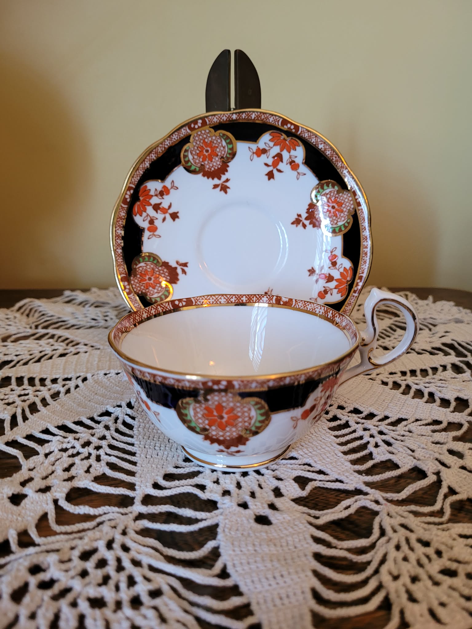 Japanese porcelain teacup and saucer set with Imari-style decoration