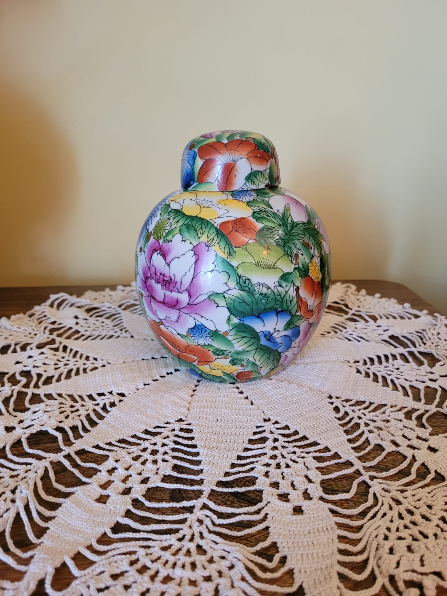 Decorative hand-painted porcelain ginger jar or covered vase