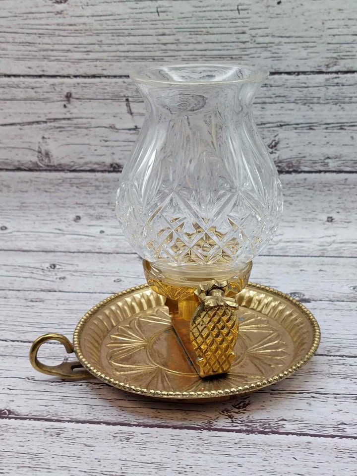 Cut glass oil lamp or candle lamp with brass/metal saucer base