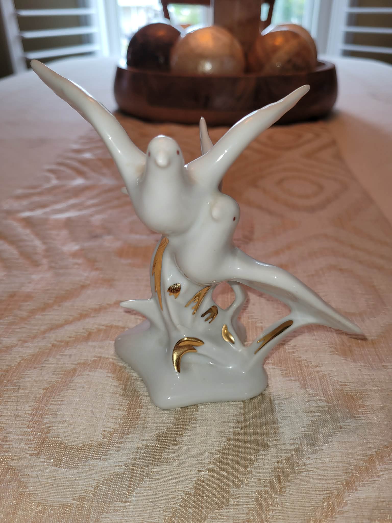 Porcelain dove figurine