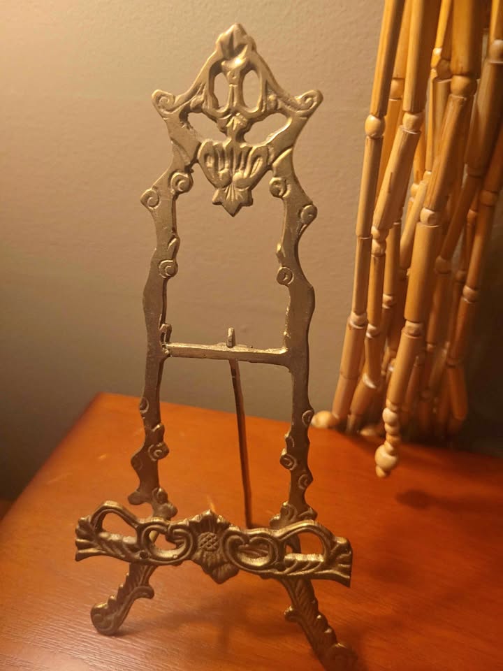 Ornate cast metal easel display stand
