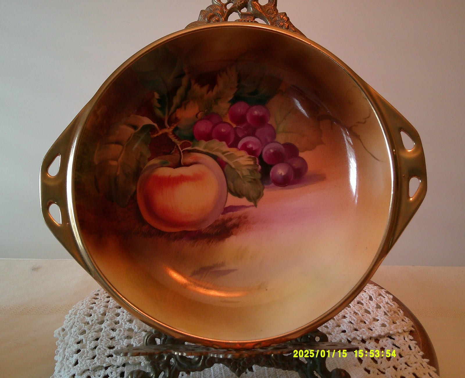 Decorative hand-painted fruit bowl / wall plaque with brass-colored handles