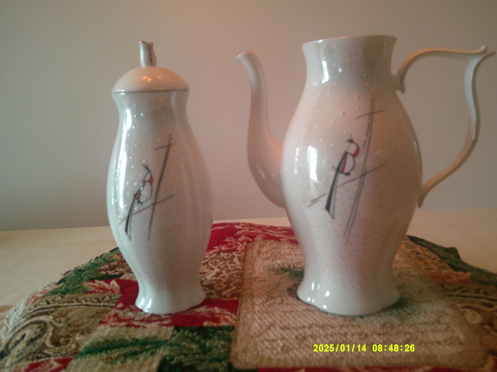 Porcelain coffee/tea service pieces (creamer and covered sugar bowl or lidded pitcher)