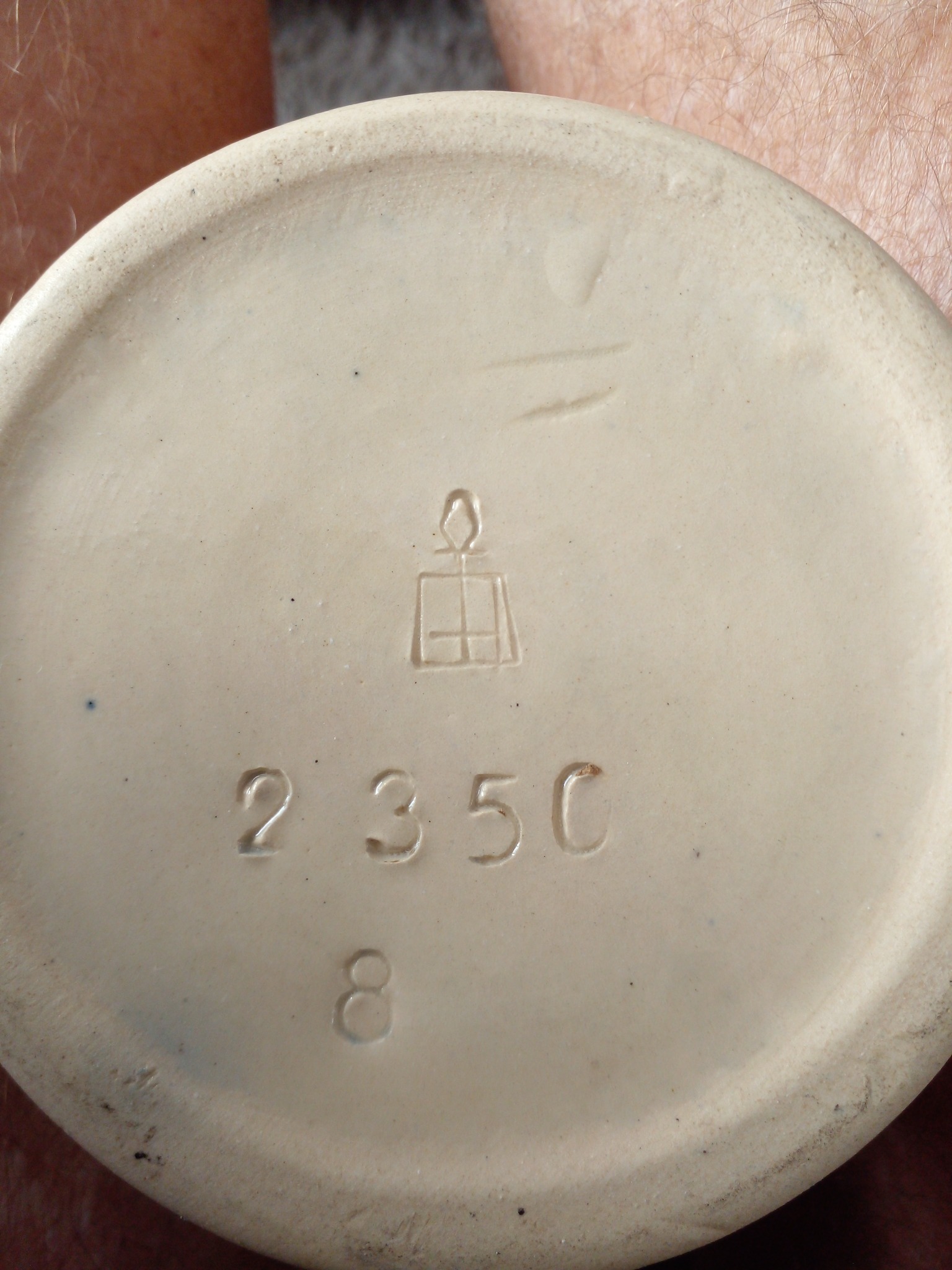Marked ceramic/porcelain base of a small decorative vessel or figurine