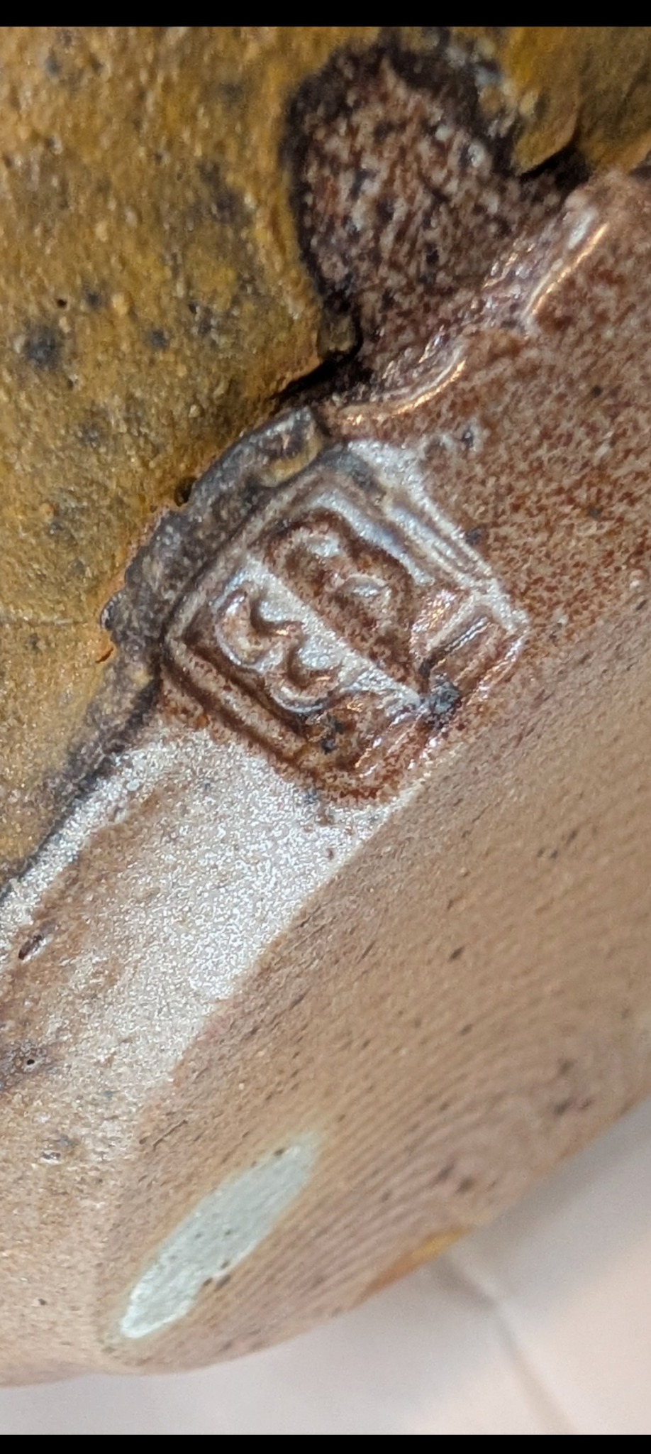 Ceramic or pottery vessel fragment with impressed maker's mark