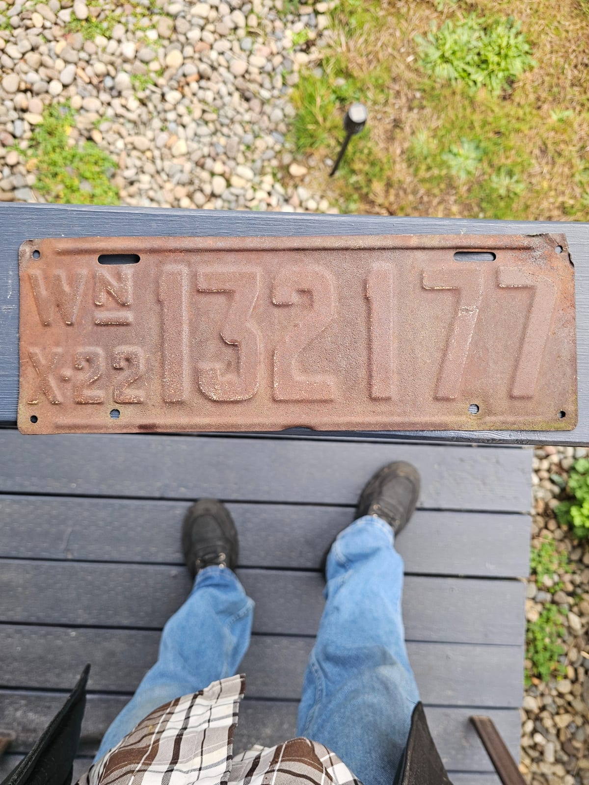 Embossed metal license plate or vehicle registration plate