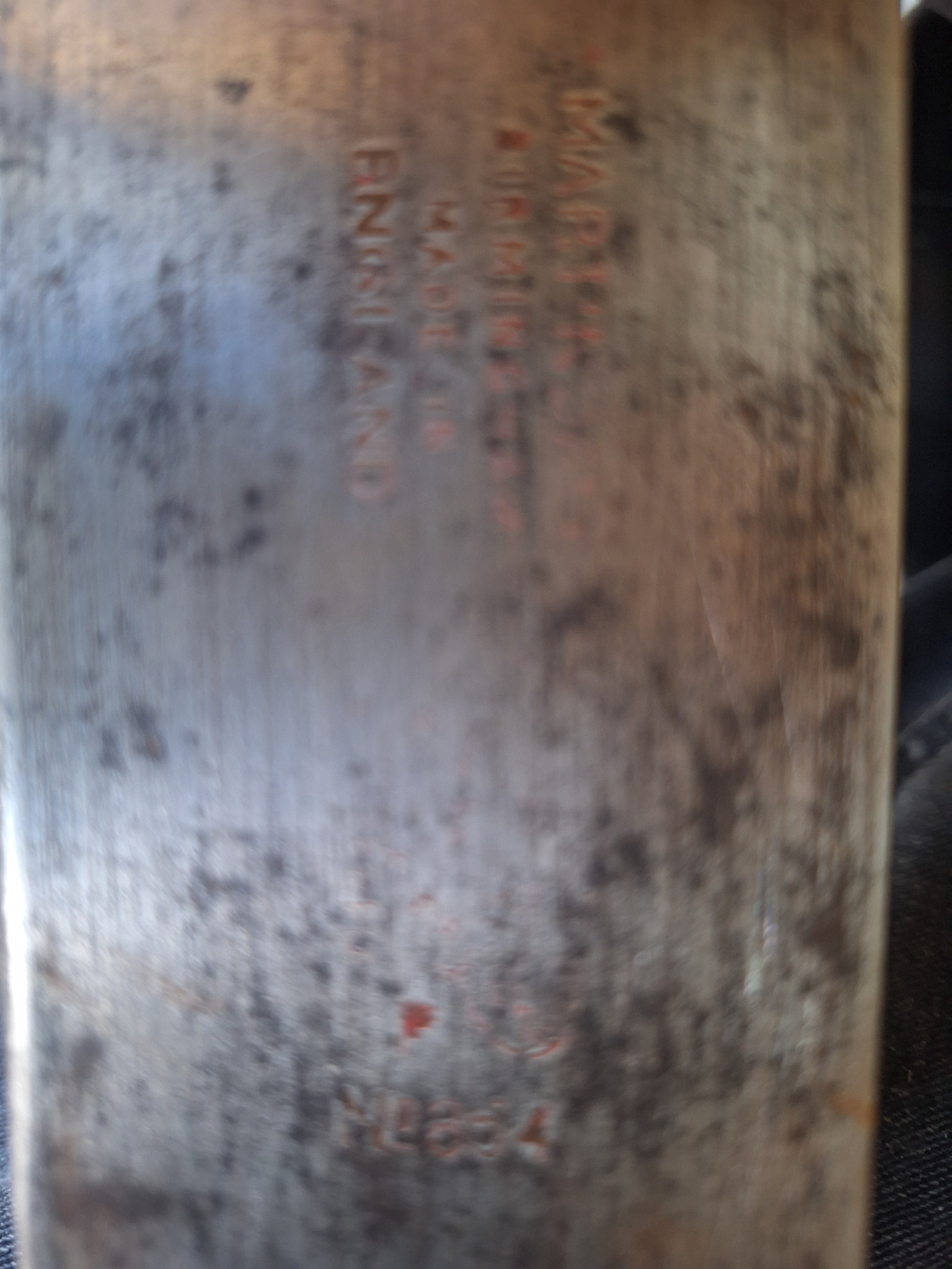 Metal cylindrical vessel or container with stamped maker's mark