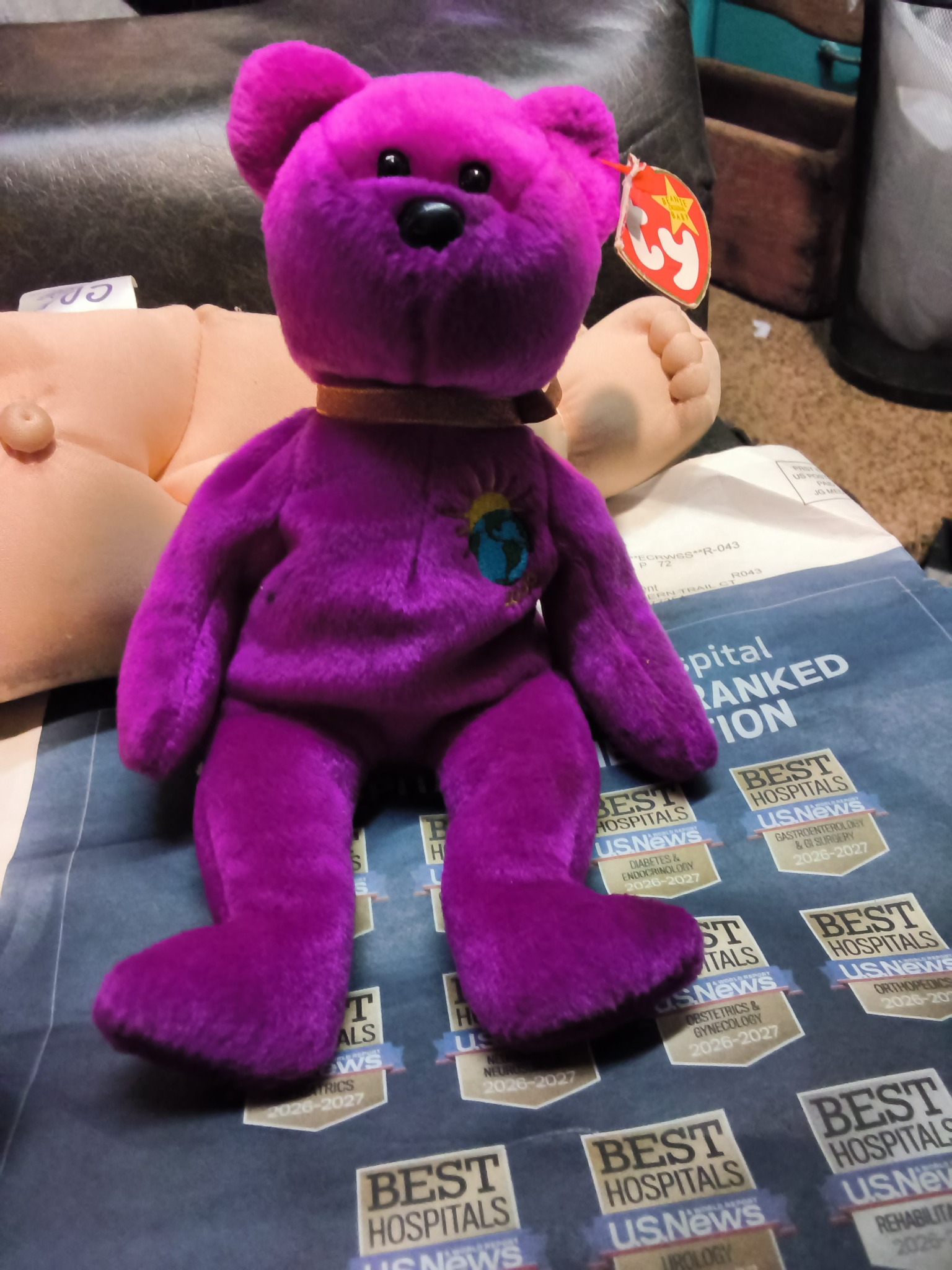 Ty Beanie Baby-style plush bear (purple bear, likely a Beanie Baby collectible)