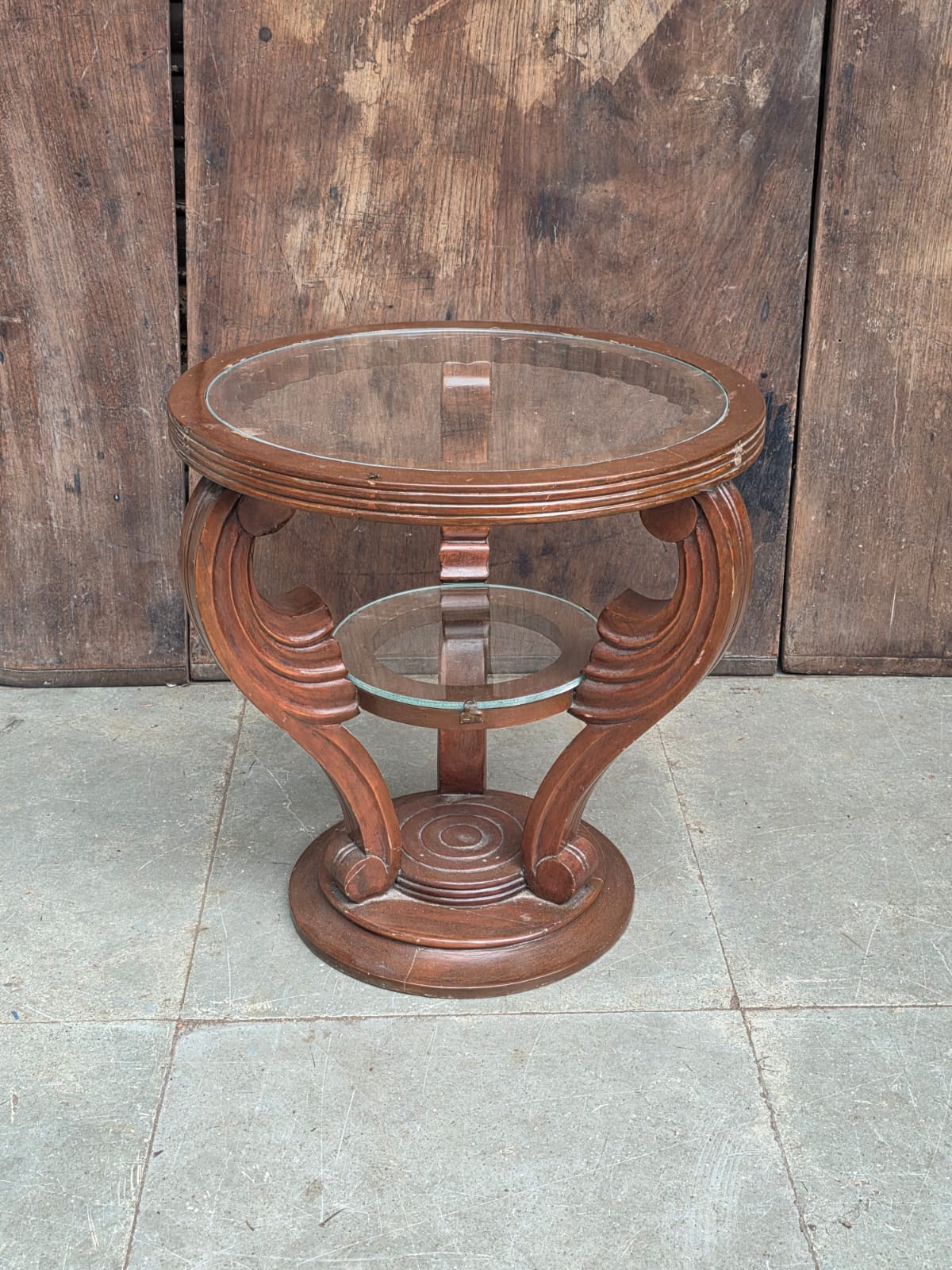 Art Deco-style round occasional table with glass shelves