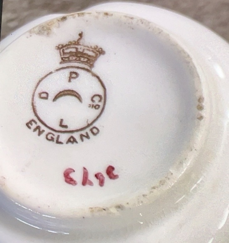 English porcelain saucer or plate with crown-and-cipher maker's mark