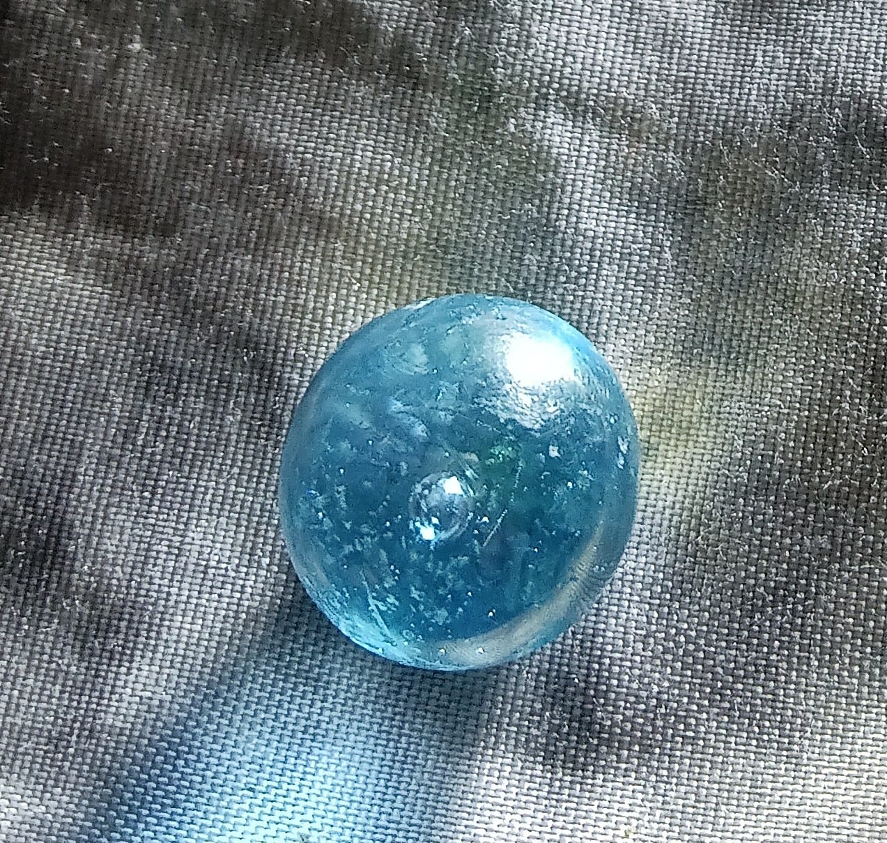 Blue glass marble or decorative glass bead