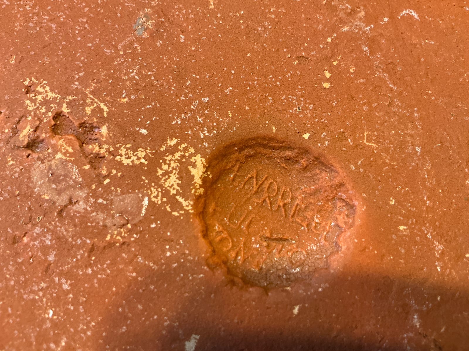 Salt-glazed stoneware or earthenware vessel base with impressed maker's mark