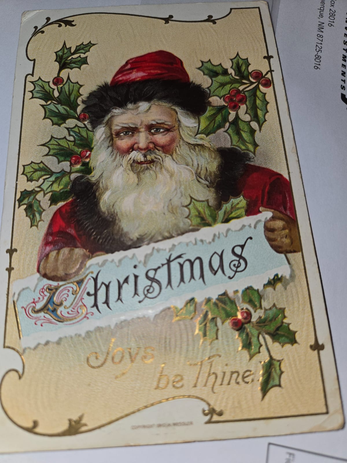 Victorian-style Christmas greeting card featuring Santa Claus