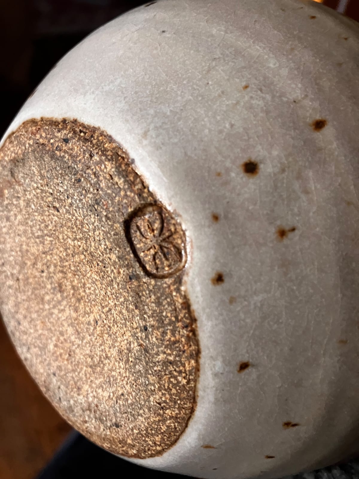 Glazed ceramic or stoneware vessel base with maker’s mark