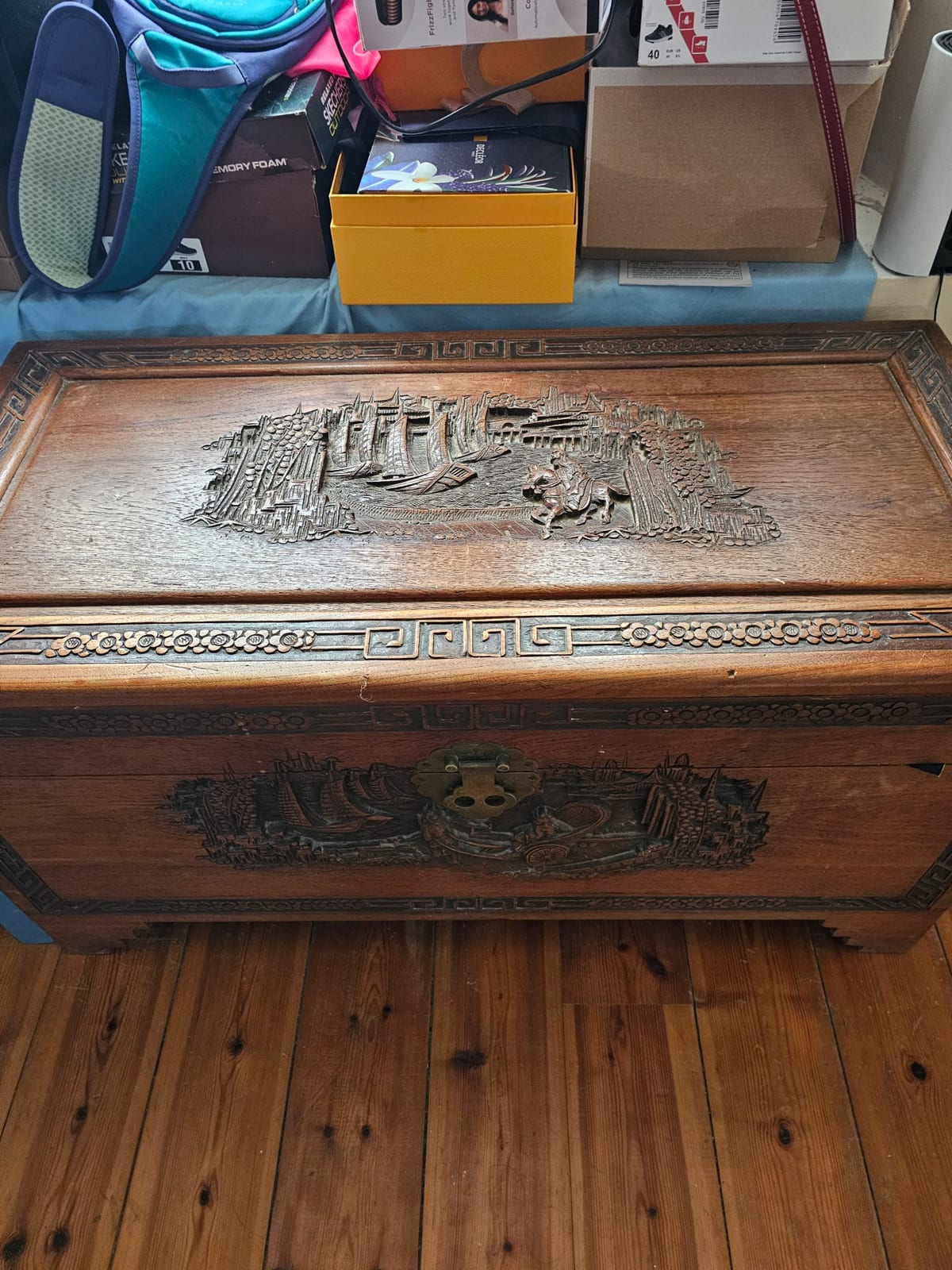 Carved wooden chest or blanket box with Chinese-style relief decoration