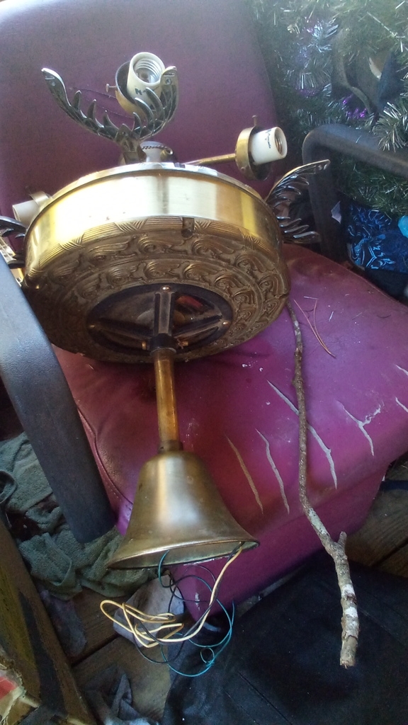 Ornate brass ceiling fan light fixture