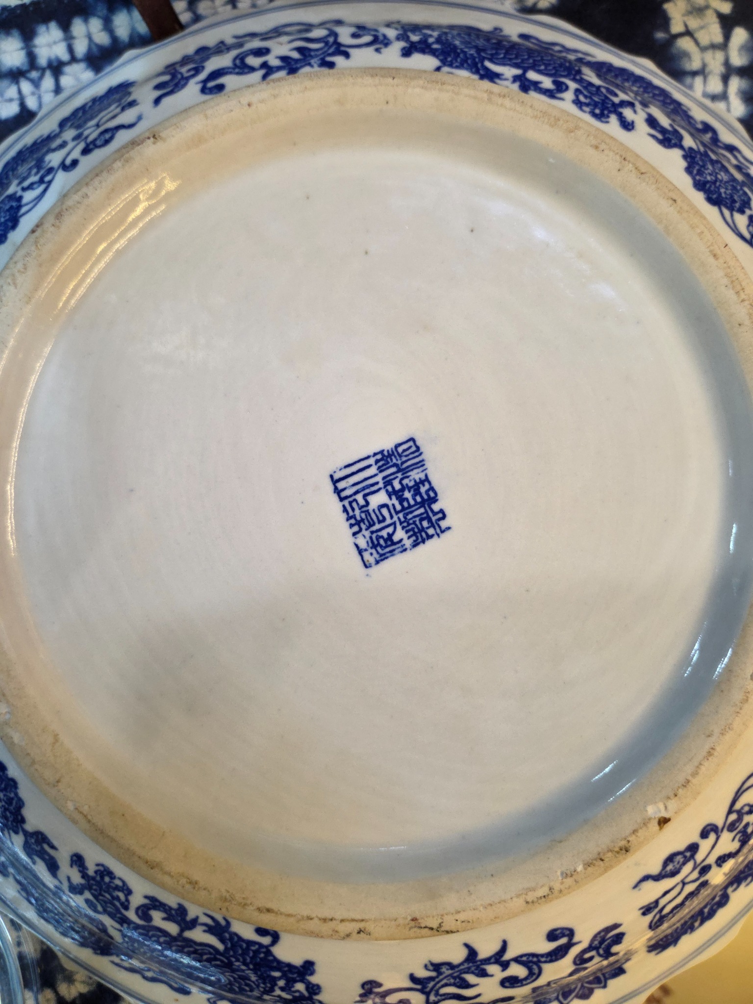 Blue and white porcelain plate with Chinese-style seal mark