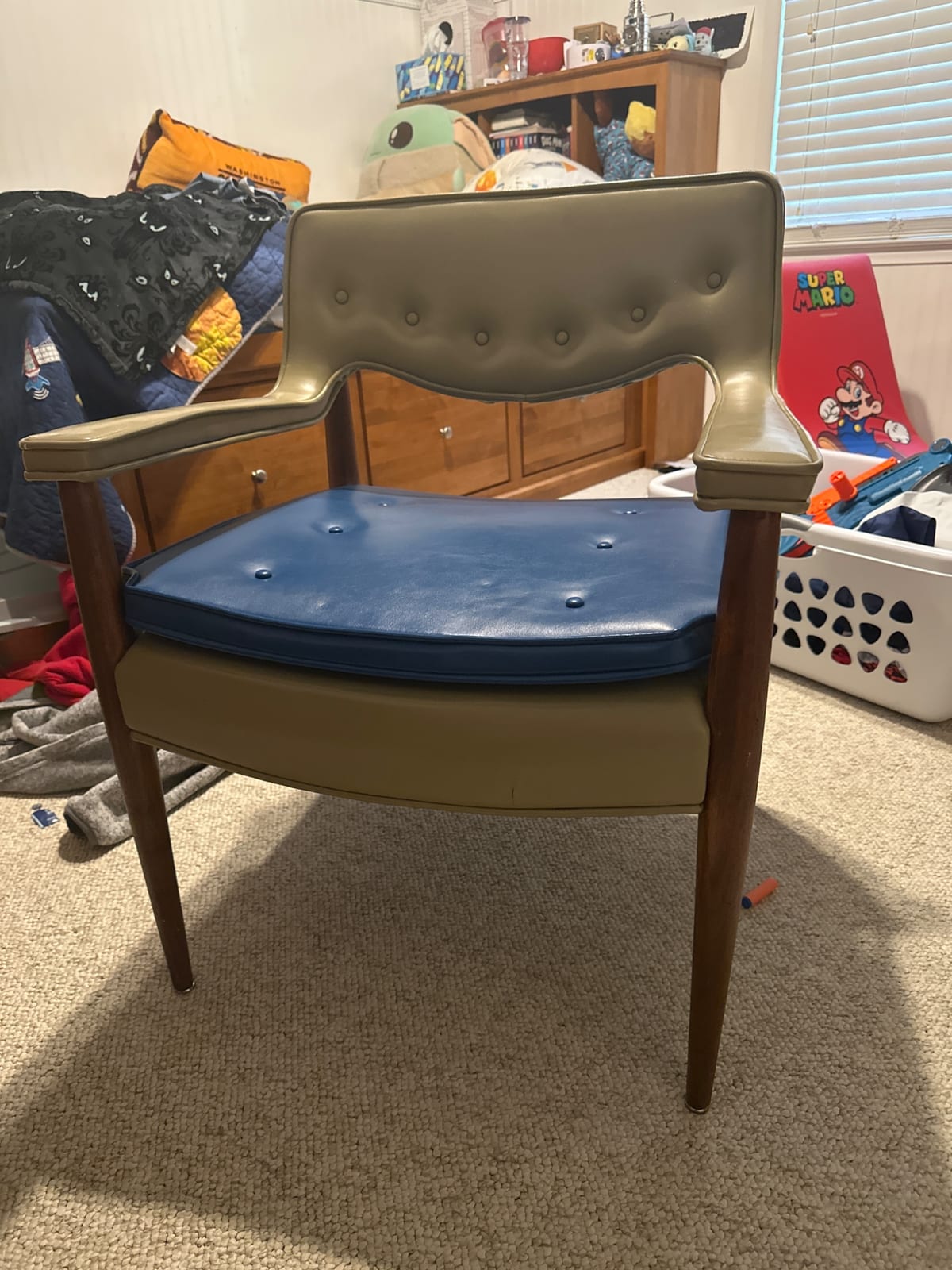 Mid-century modern upholstered lounge chair with walnut legs