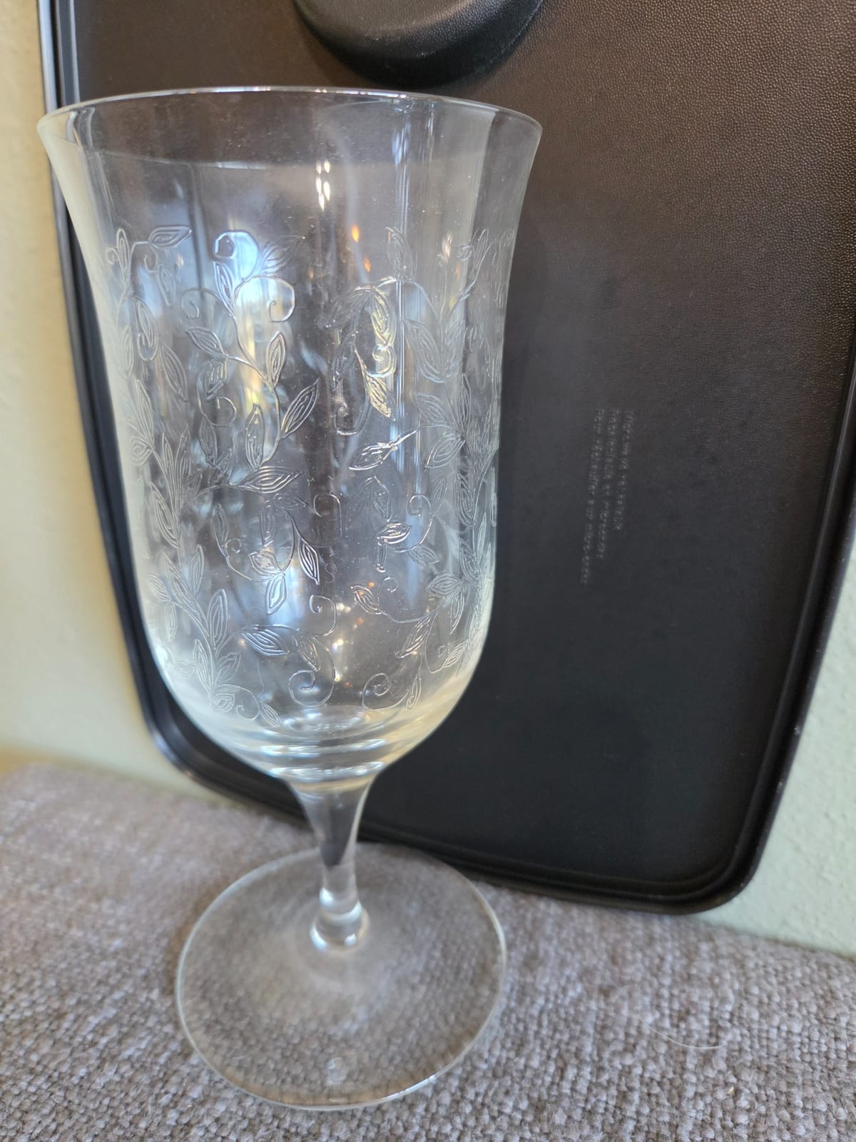 Etched stemmed wine goblet / champagne flute-style glass