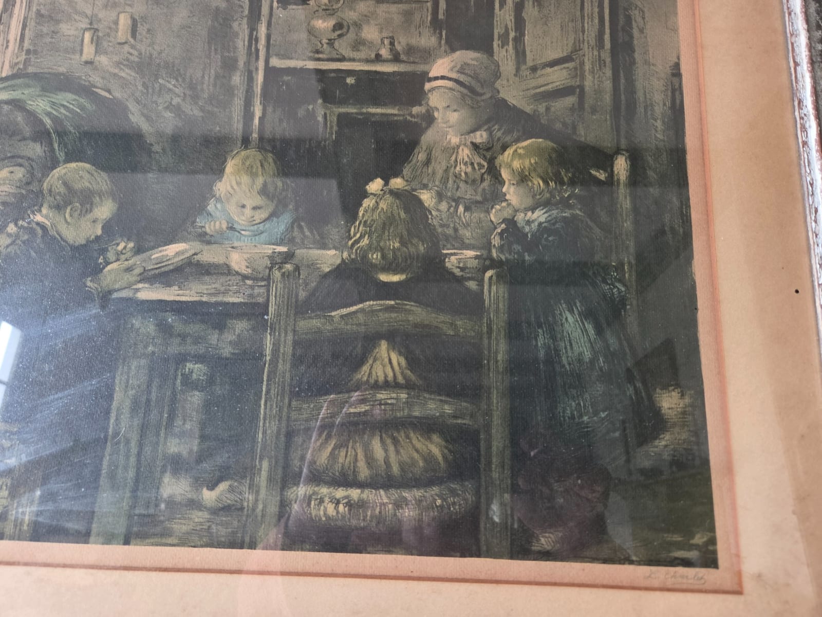 Framed color print or lithograph depicting children at a table