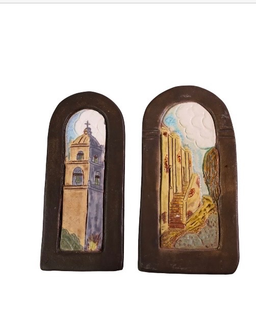 Pair of painted ceramic or plaster devotional plaques / miniature wall panels
