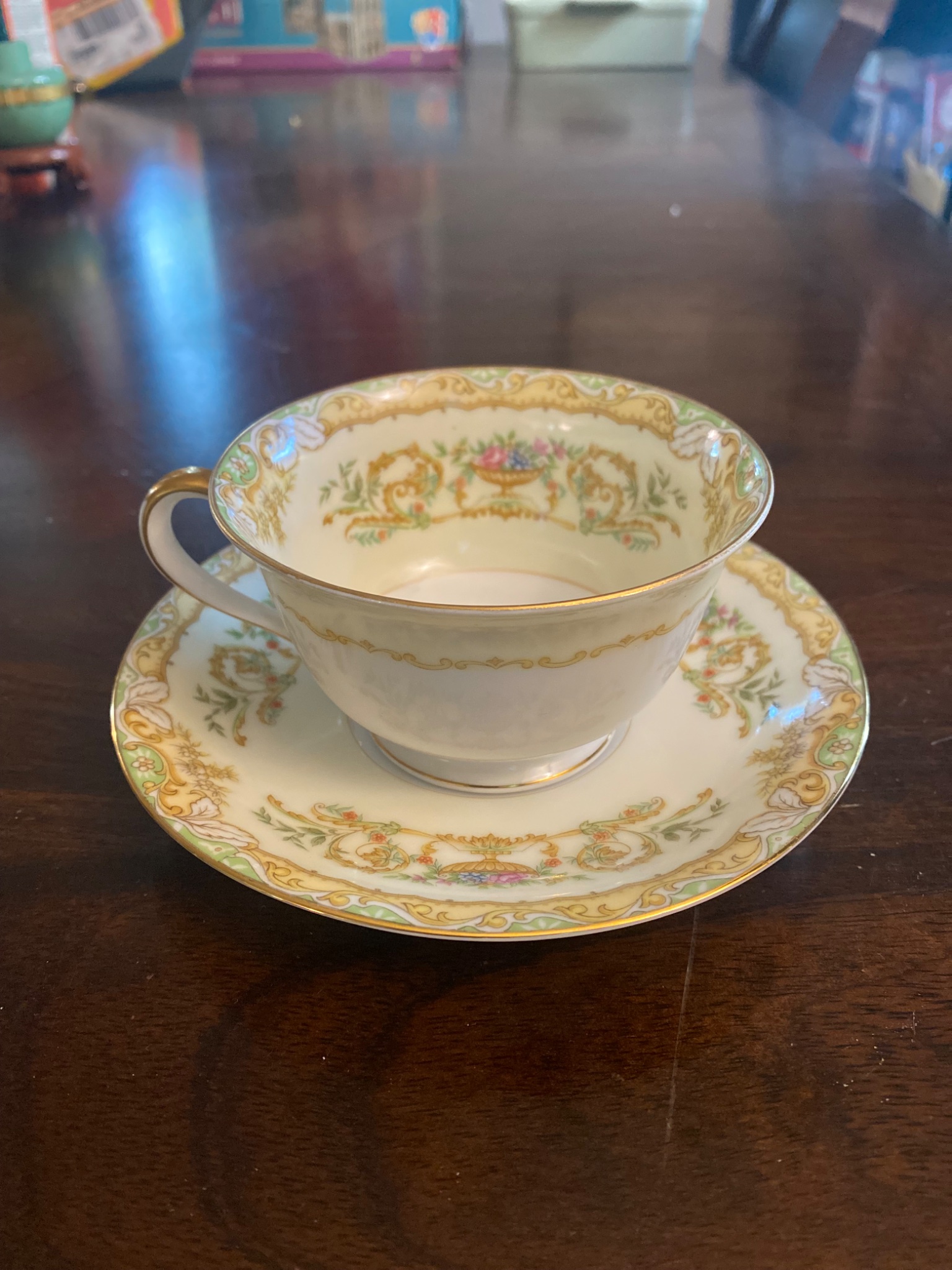 Decorative porcelain teacup and saucer