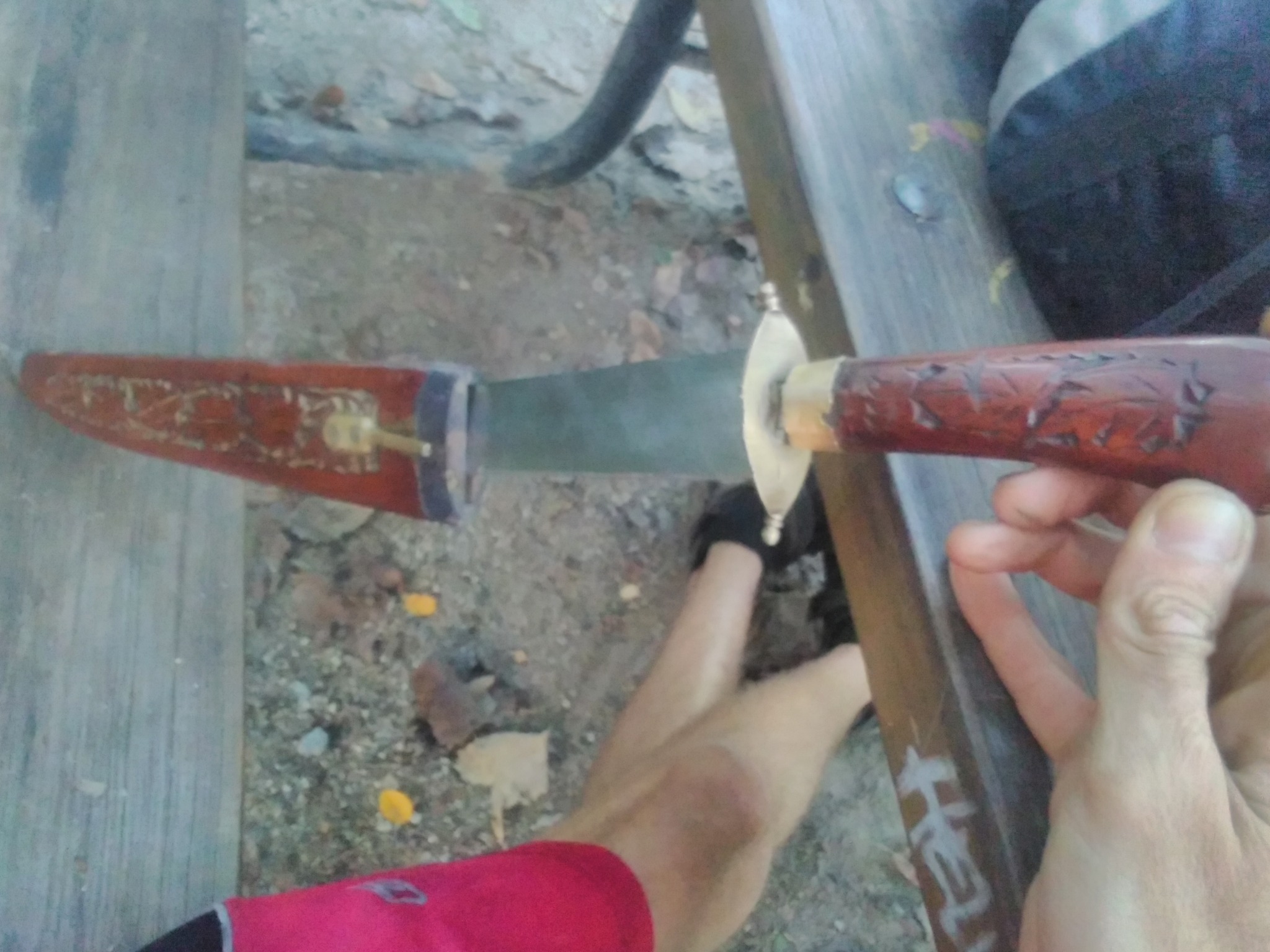 Decorative fixed-blade knife (possibly a souvenir or custom-made dagger-style knife)