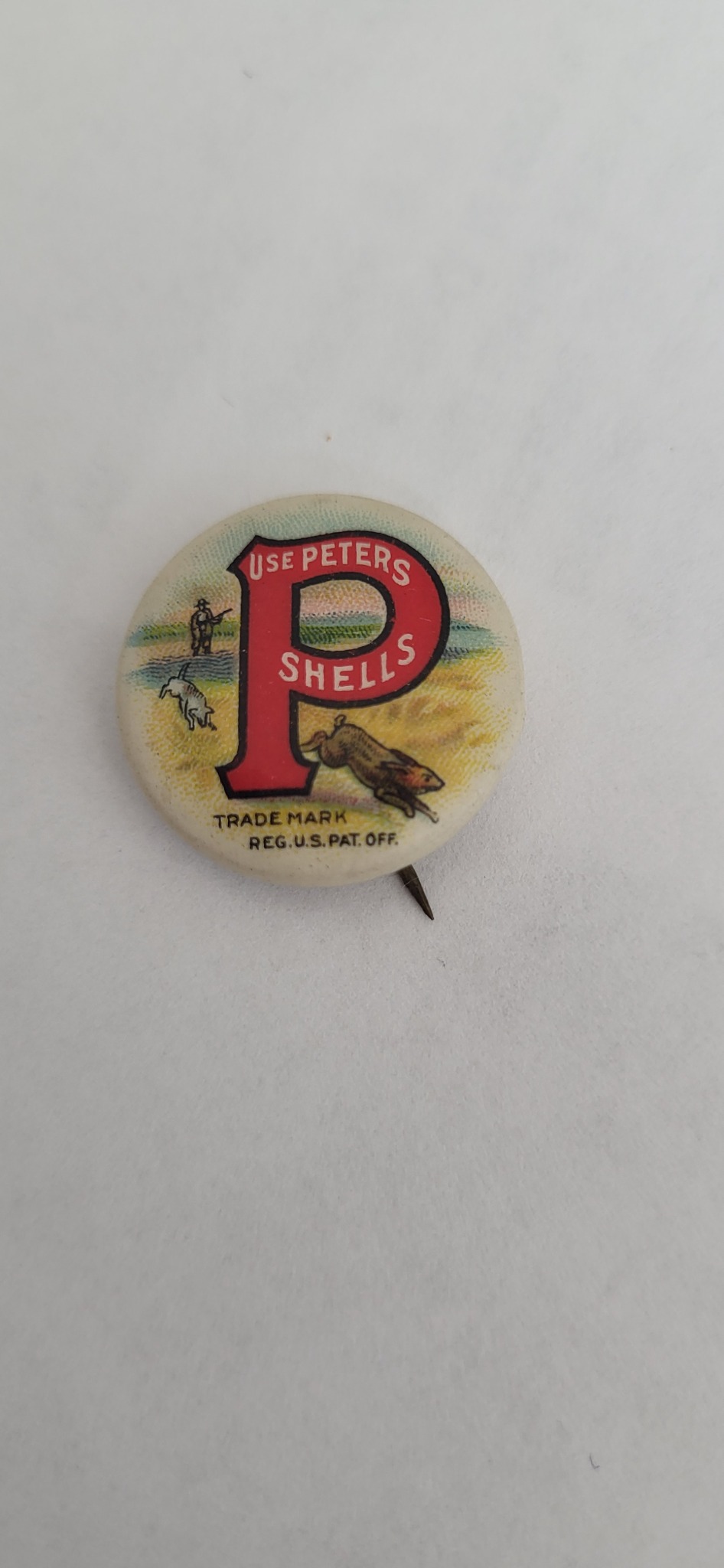 Peters Shells advertising pinback button or lapel pin