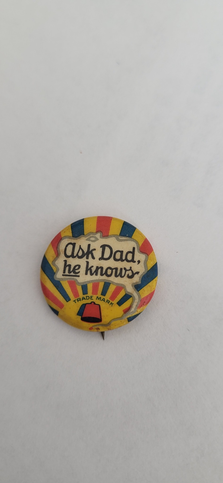 Vintage advertising pinback button / badge reading "Ask Dad, he knows"