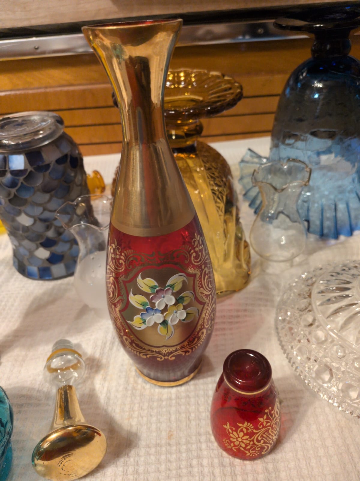 Decorative glass perfume bottle or bud vase with enamel floral decoration