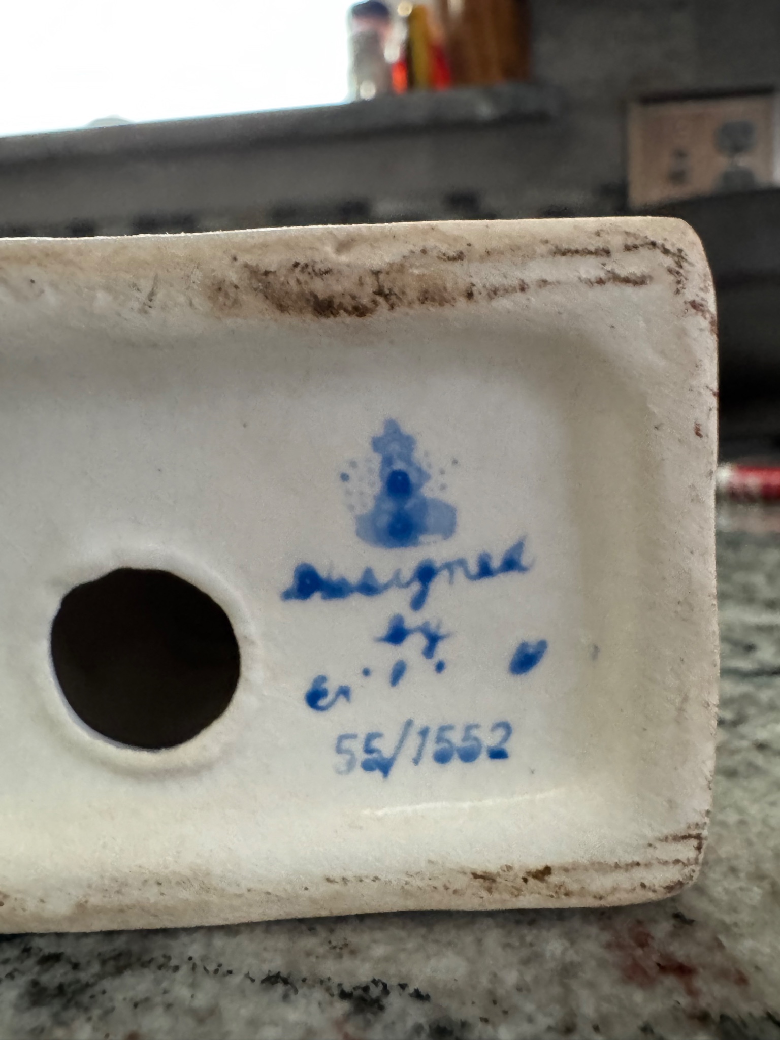 Porcelain ceramic base or footed component with maker's mark