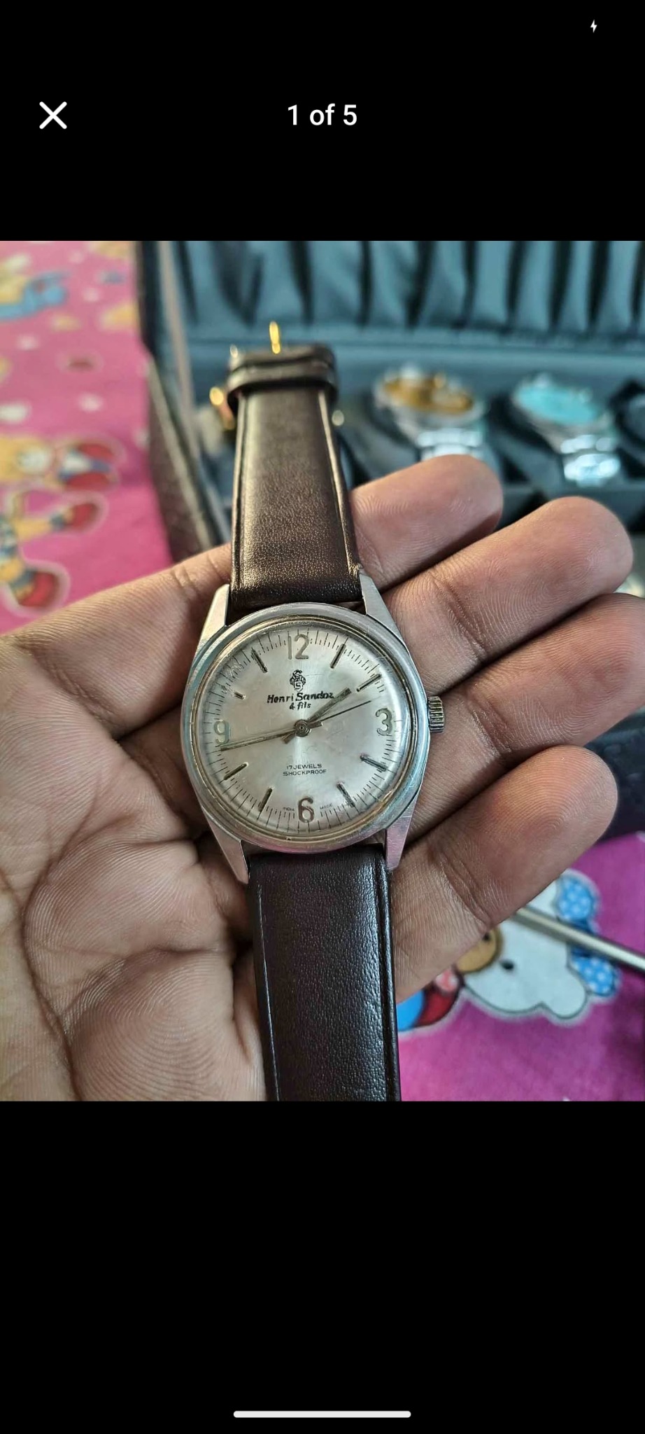 Henri Sandoz & Fils manual-wind wristwatch