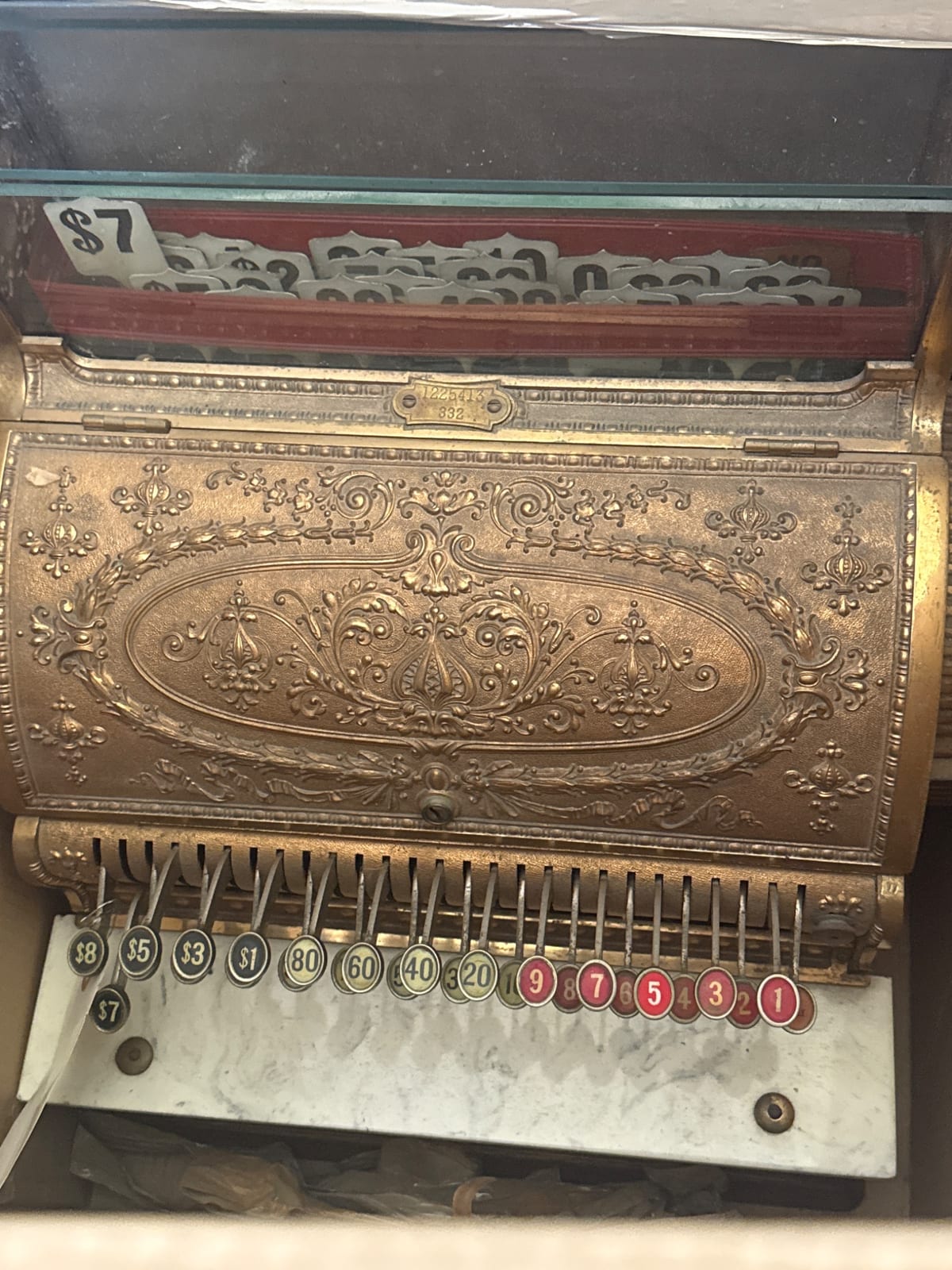 Antique mechanical cash register / coin-operated trade stimulator