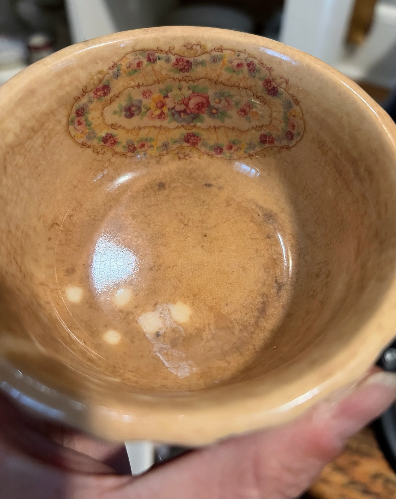 Decorative ceramic bowl or cup (possibly hand-painted porcelain)