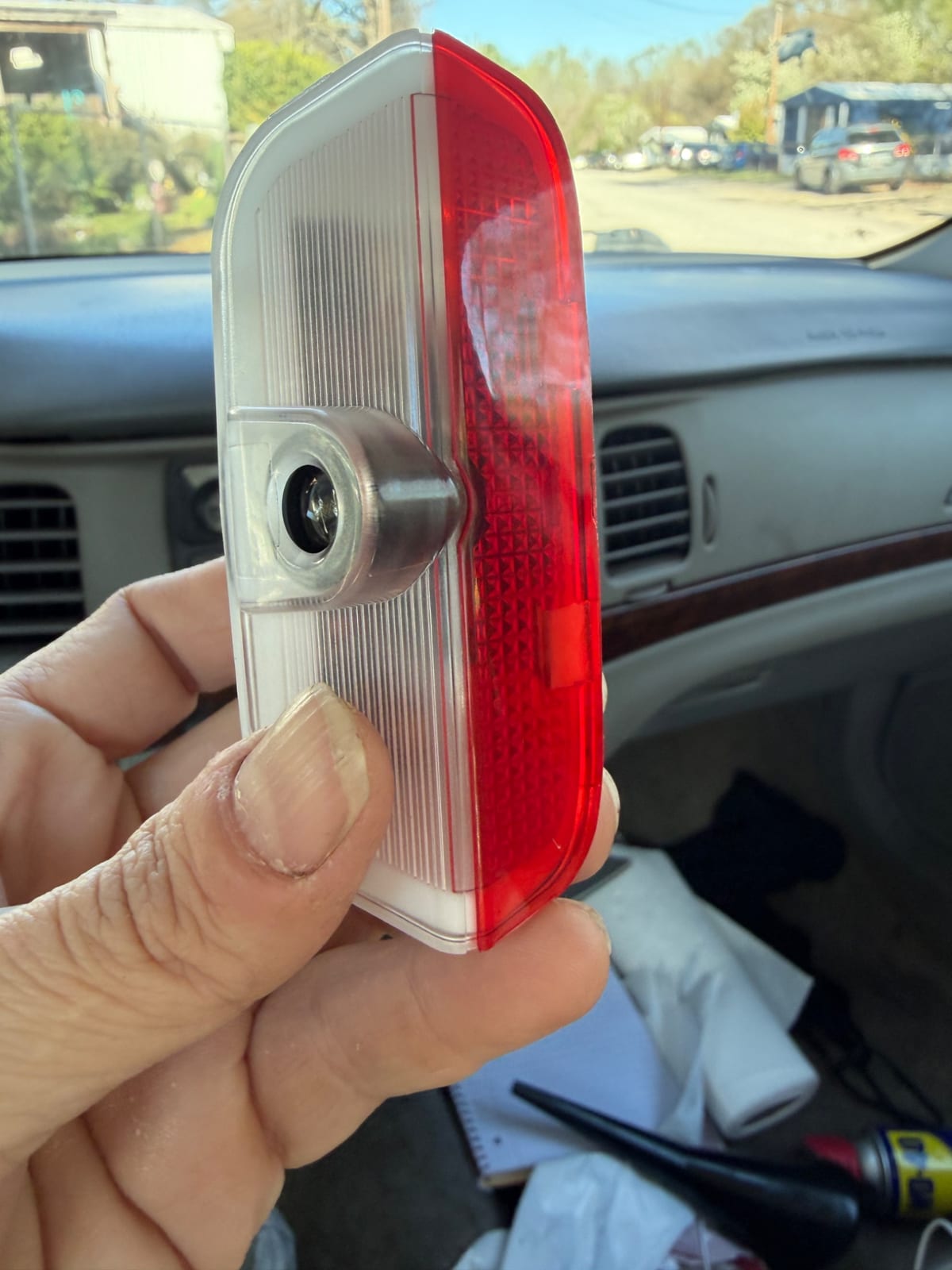 Automotive interior courtesy/door warning light lens assembly