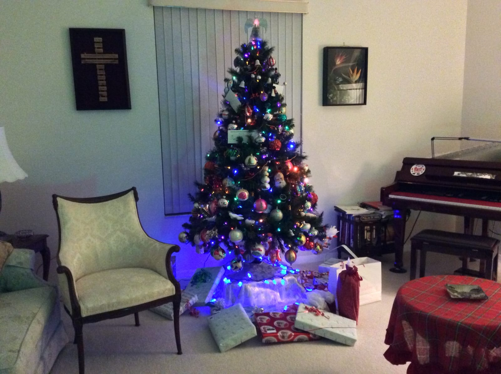 Decorated artificial Christmas tree with vintage-style ornaments