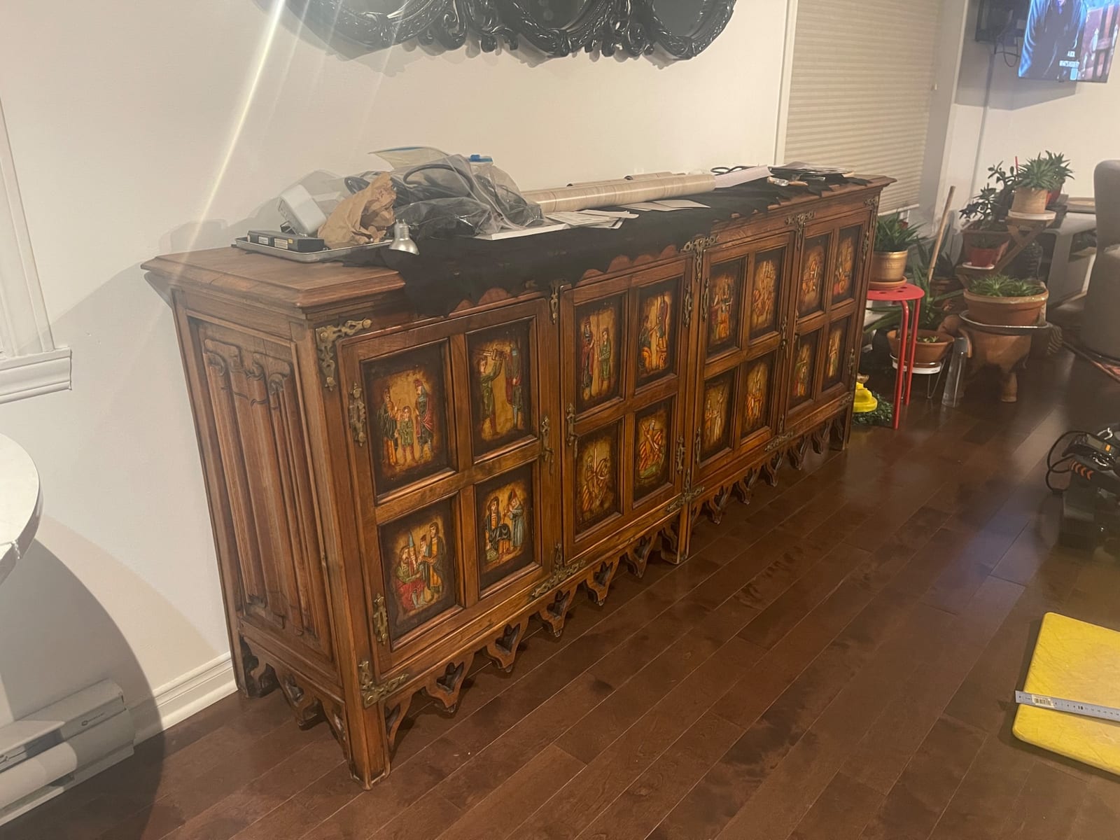 Carved wooden sideboard/cabinet with painted figural panels