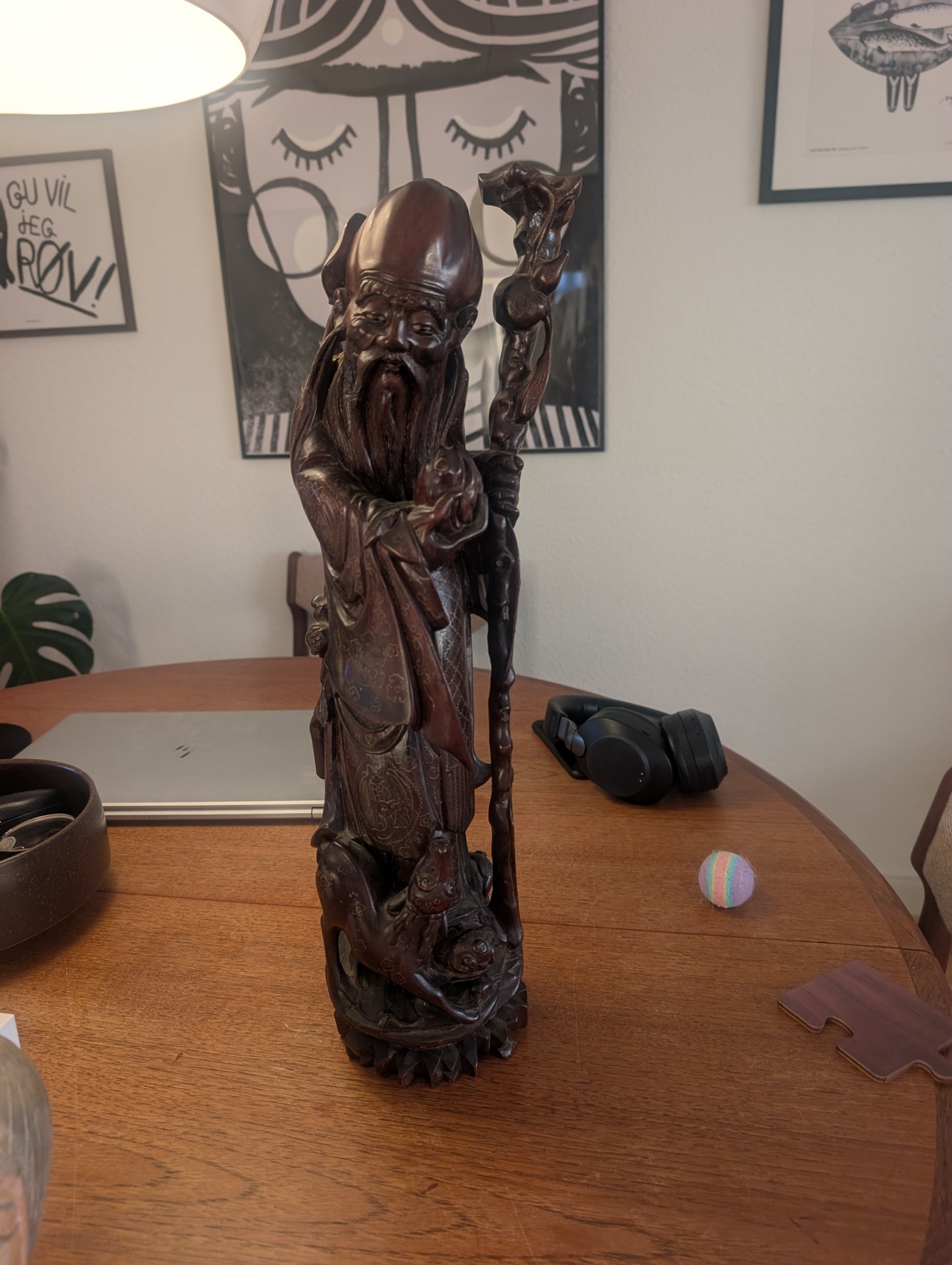 Carved hardwood or ebony-style Asian scholar/deity figure with staff