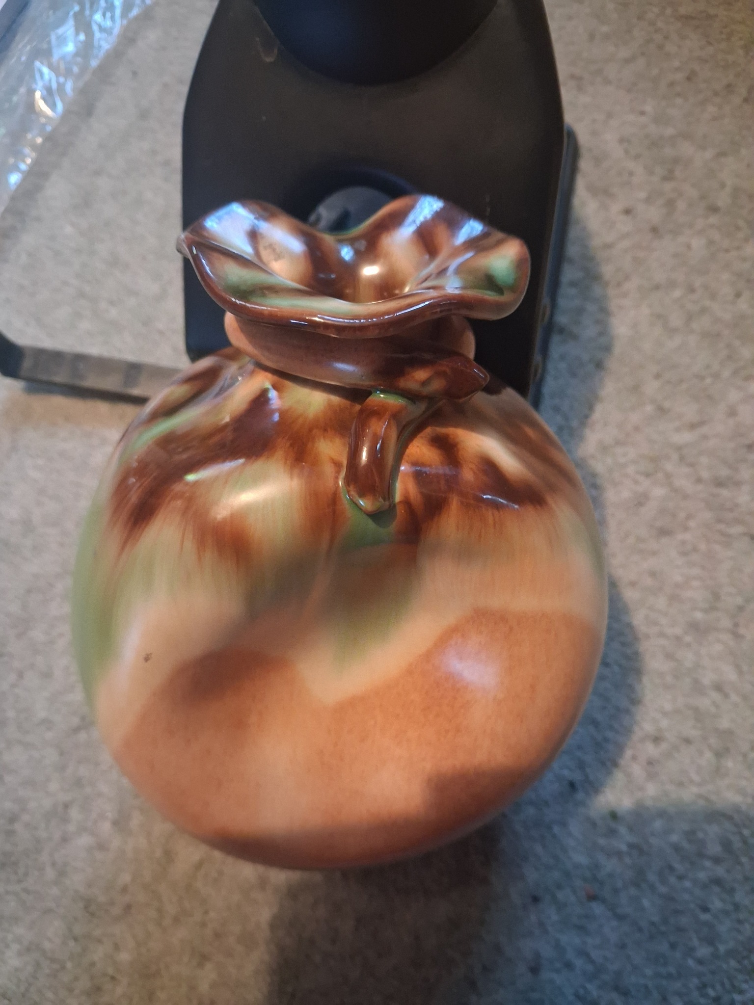 Decorative ceramic pitcher or vase with applied handle