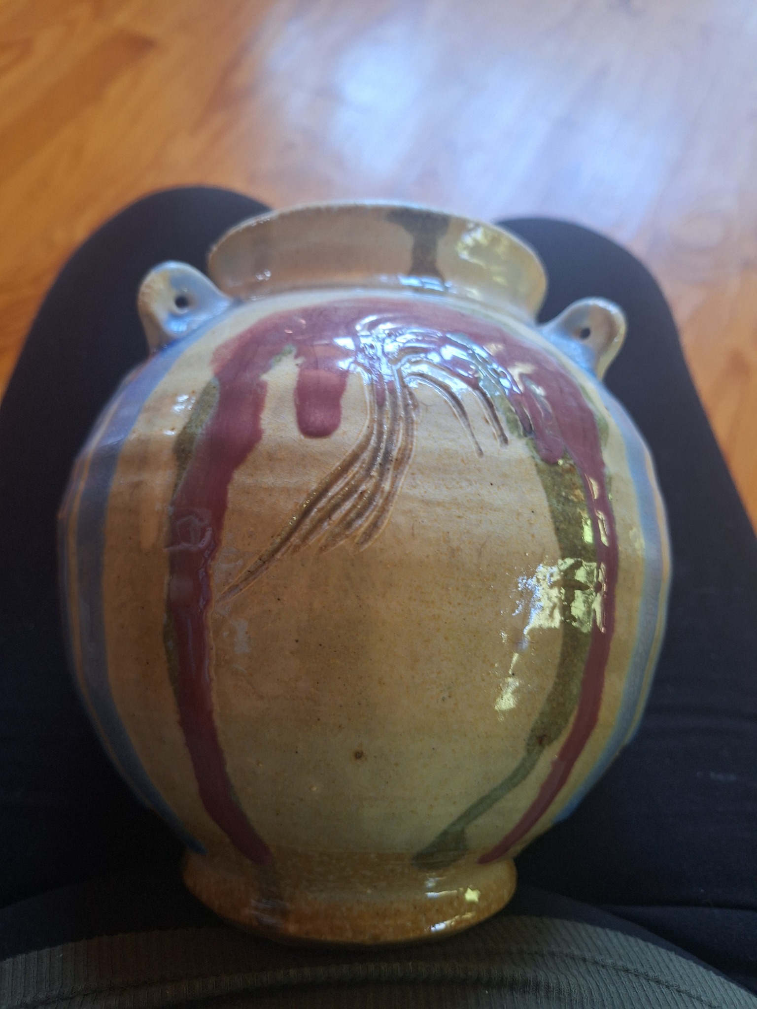 Small decorative ceramic vase or jar with applied handles
