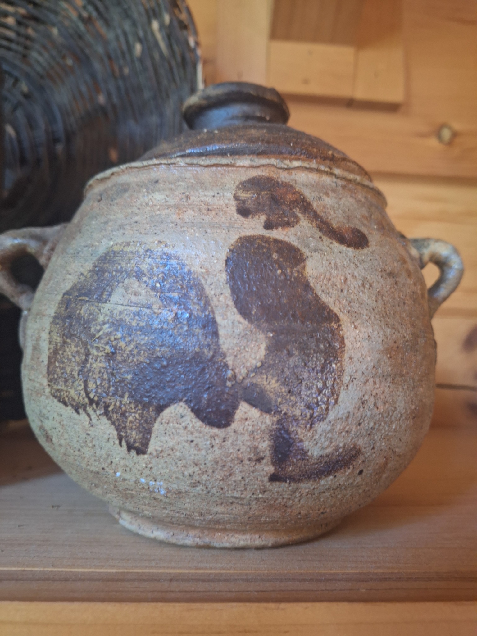 Japanese stoneware jar with iron-painted decoration