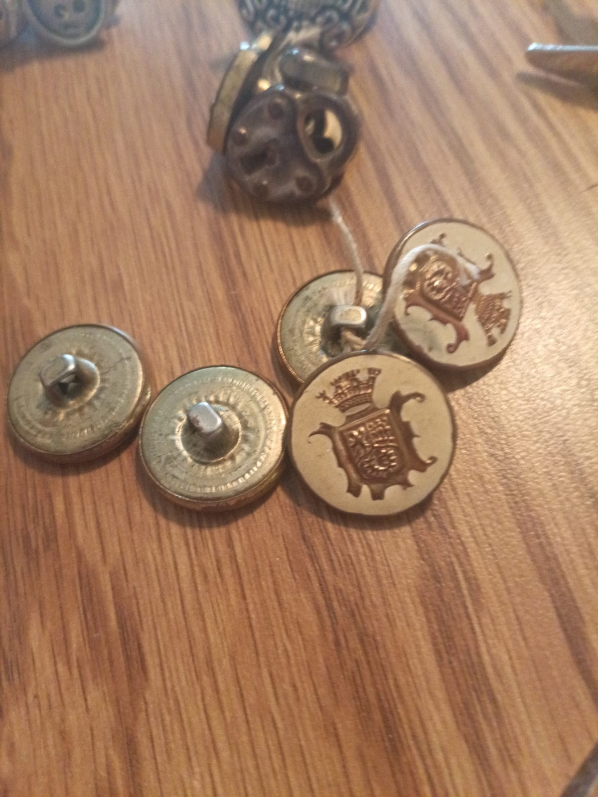 Set of decorative metal buttons or cufflink-style garment fasteners