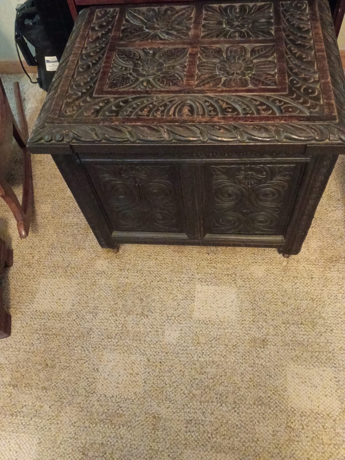Carved wooden chest or trunk with decorative floral panels