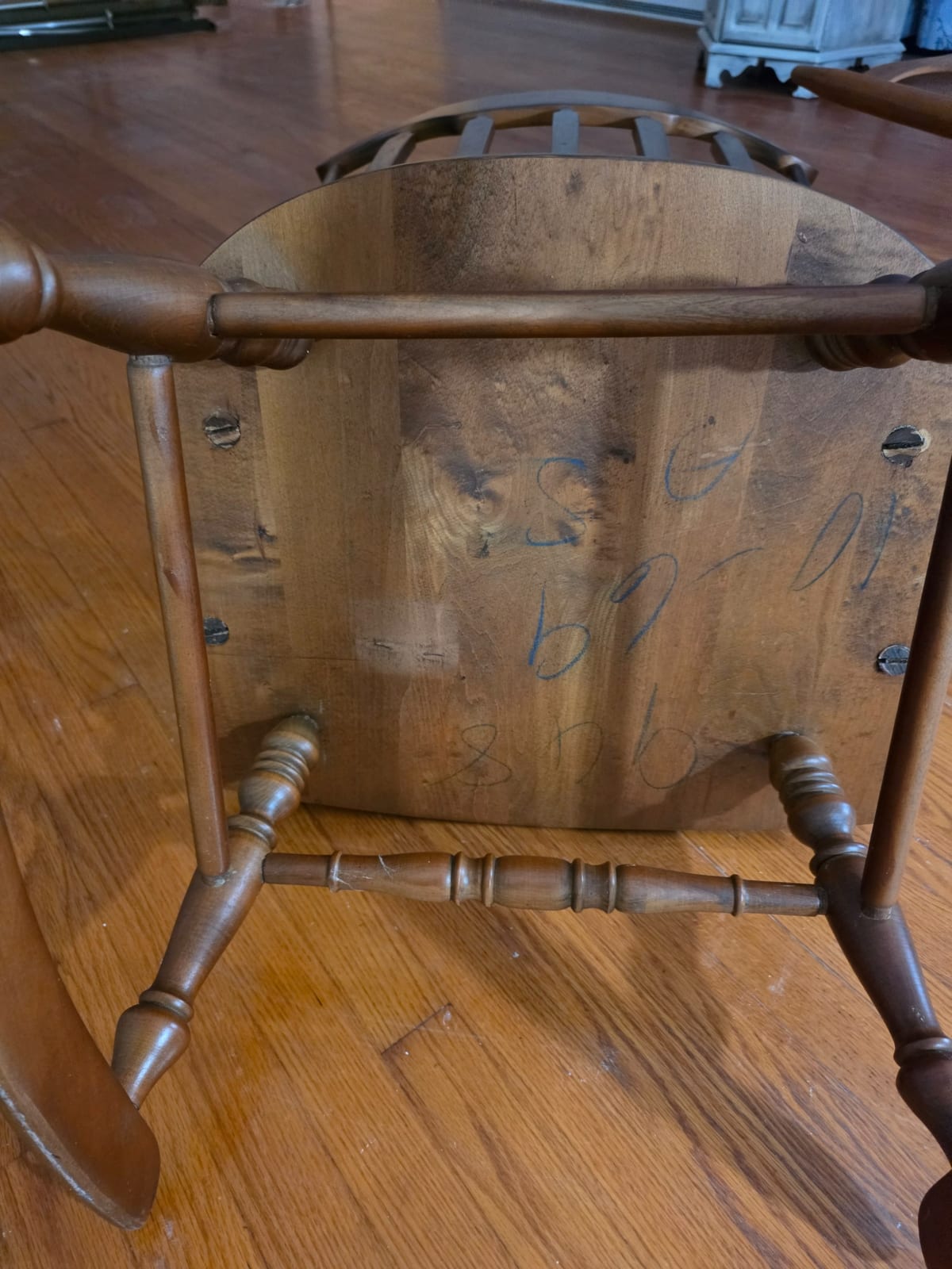 Wooden Windsor-style chair (viewed from underside)