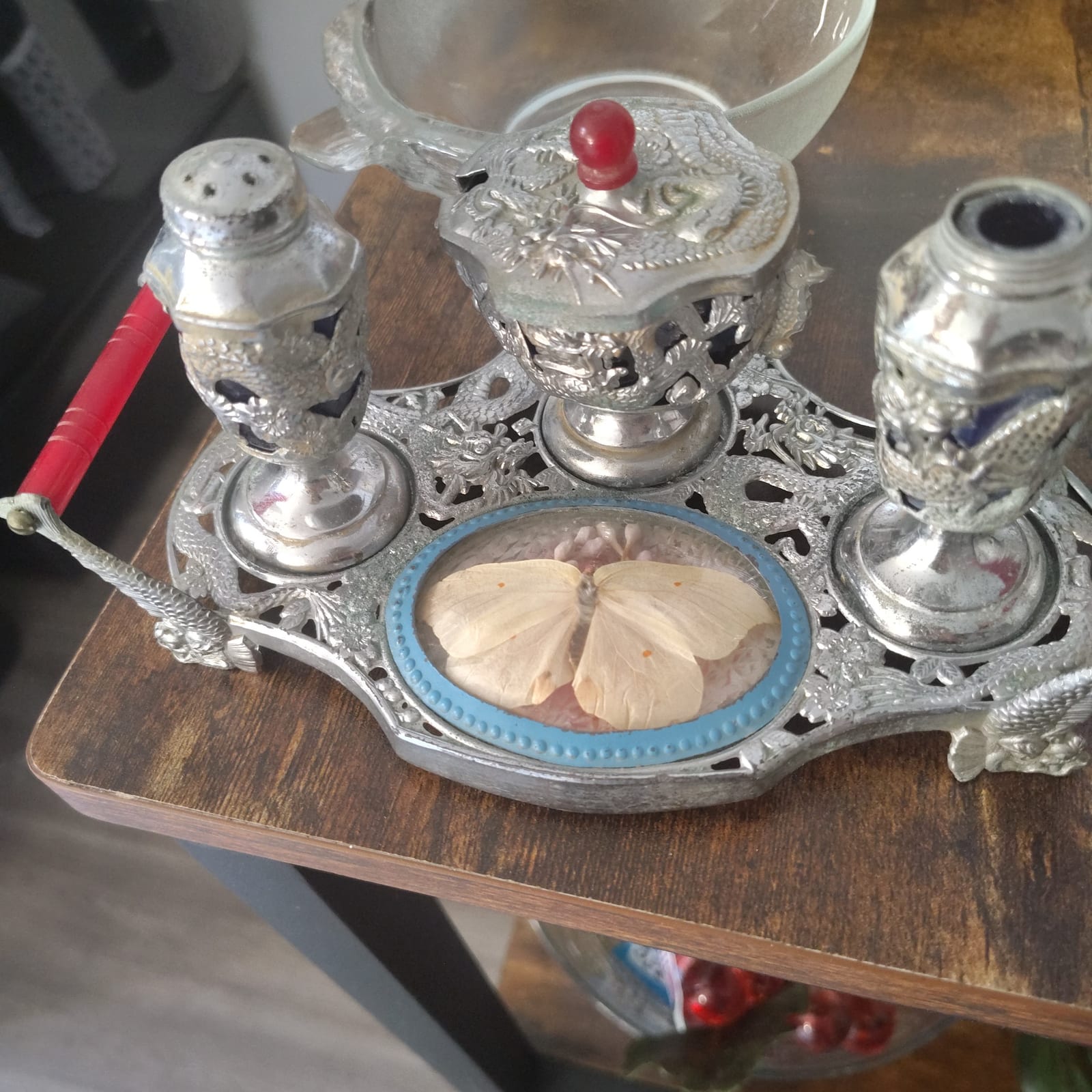 Decorative silver-plated vanity or dressing table set with glass inkwells and butterfly paperweight/compartment