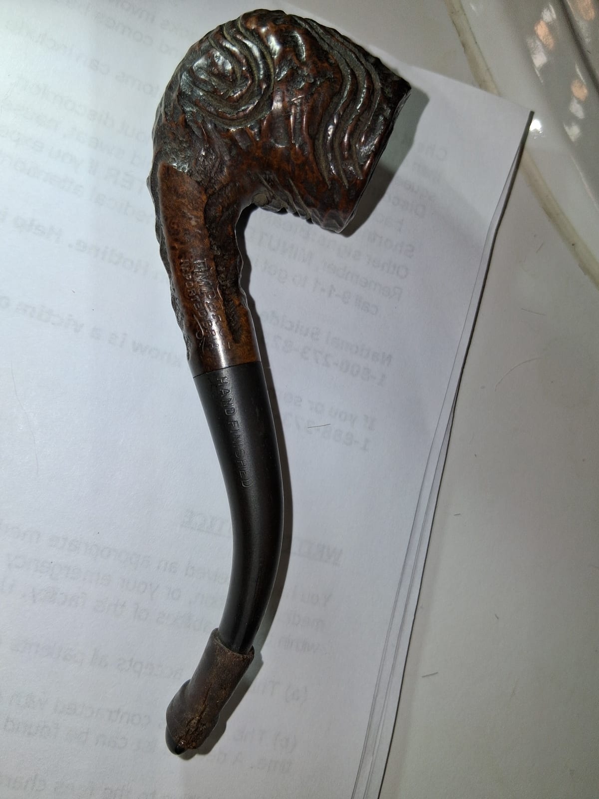 Carved briar smoking pipe with horn stem