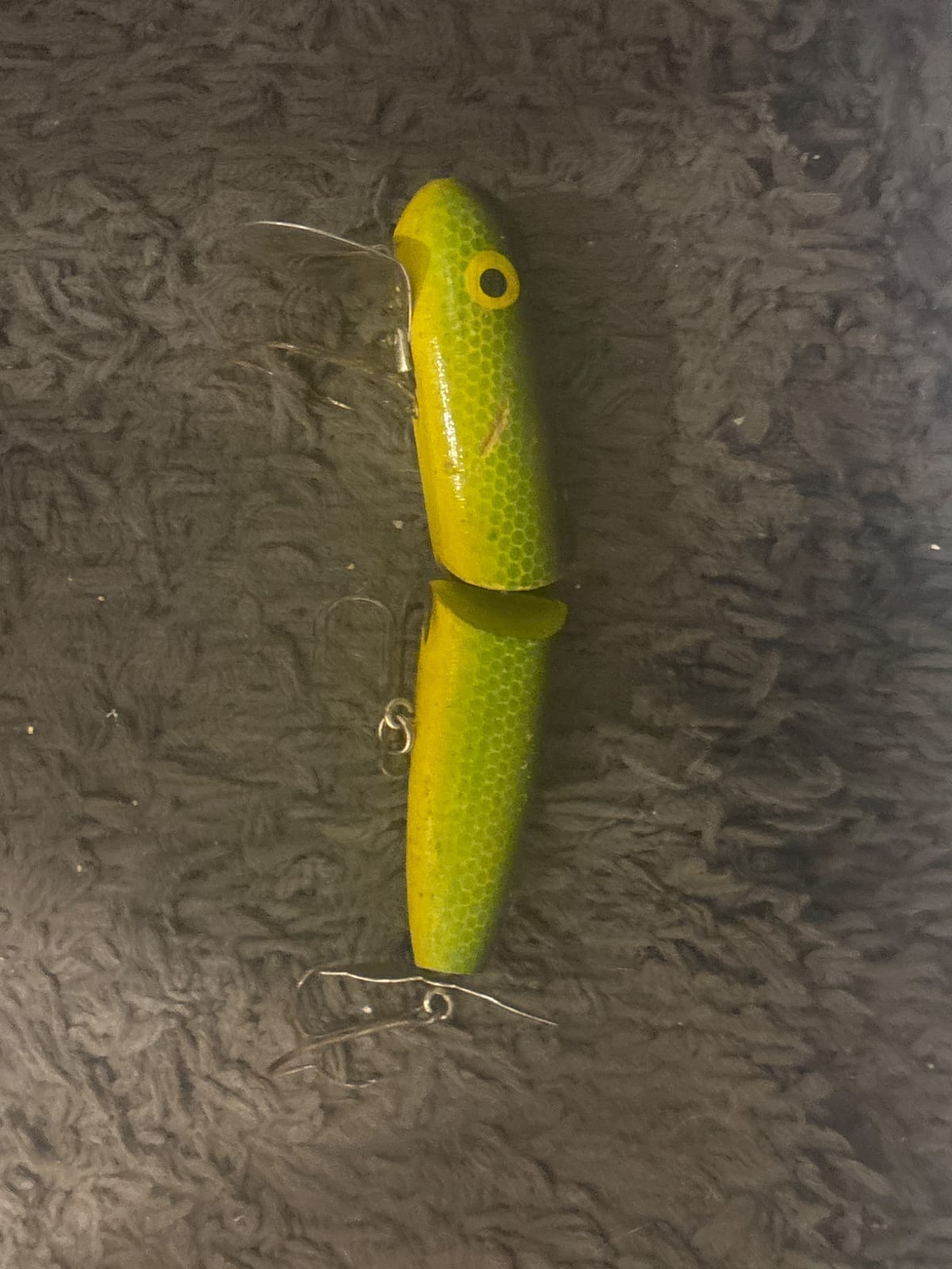 Vintage fishing lure, likely wooden topwater plug